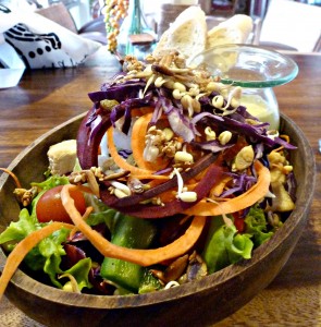 Focus on fruits and veggies, like this salad in Ubud, Bali, when traveling.