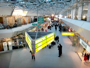 A layover at Berlin Tegel Airport. Avoid flying direct to save money on travel. More money-saving travel tips on The Mochilera Diaries