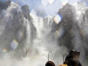 Riding a speed boat under Iguazu Falls, Argentina