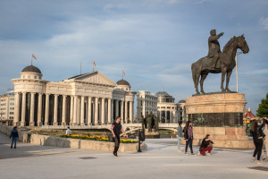 A statue of well-known revolutionary figure Goce Delcev and the "Boatmen of Thessaloníki" monument in front of the newly-built Museum of Archaeology