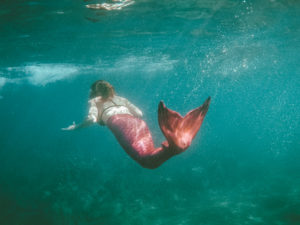 Becoming a mermaid on a Maui mermaid tour!